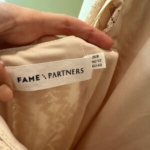 Size 8 never worn Anthropologie dress. Pet and smoke free home.